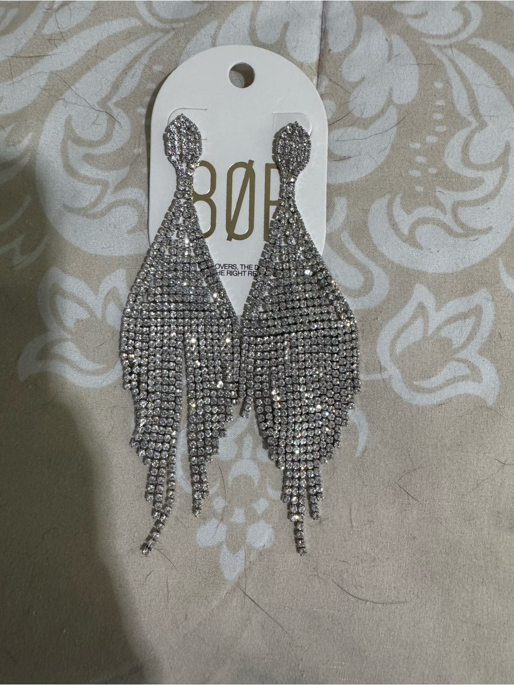 Silver Rhinestone Fringe Statement Earrings purchased from revolve